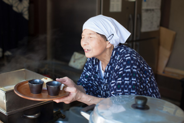 The adorable Japanese woman who sold us our tofu dumplings (even though we only got two dumplings, she kindly gave all five of us tea)